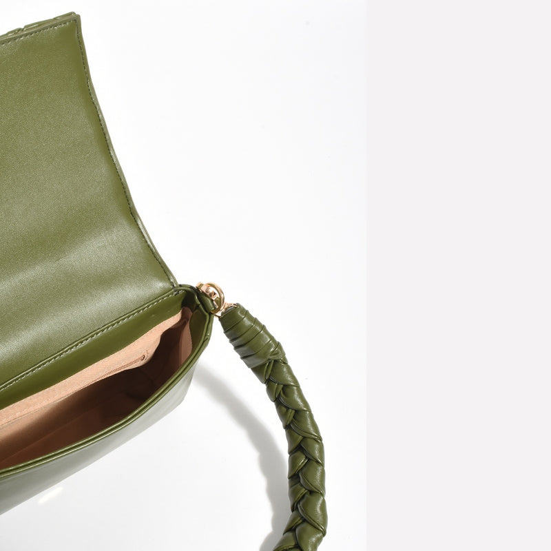 Inside the bag - its lined and has a zip compartment.