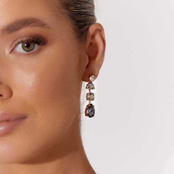 Zahra Jewel Drop Earrings in smoke and clear jewels. Model pic