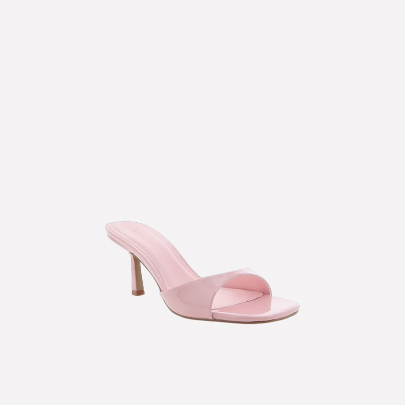 This pink patent heel is an easy slip on style with a single strap near the toes.