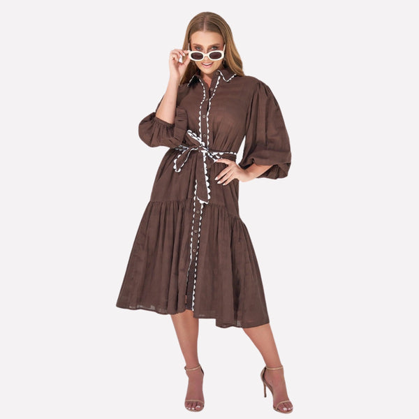 Abigail Shirt Dress in a gorgeous chocolate brown colour. Features white ric rac detailing on the collar, button front and belt. 