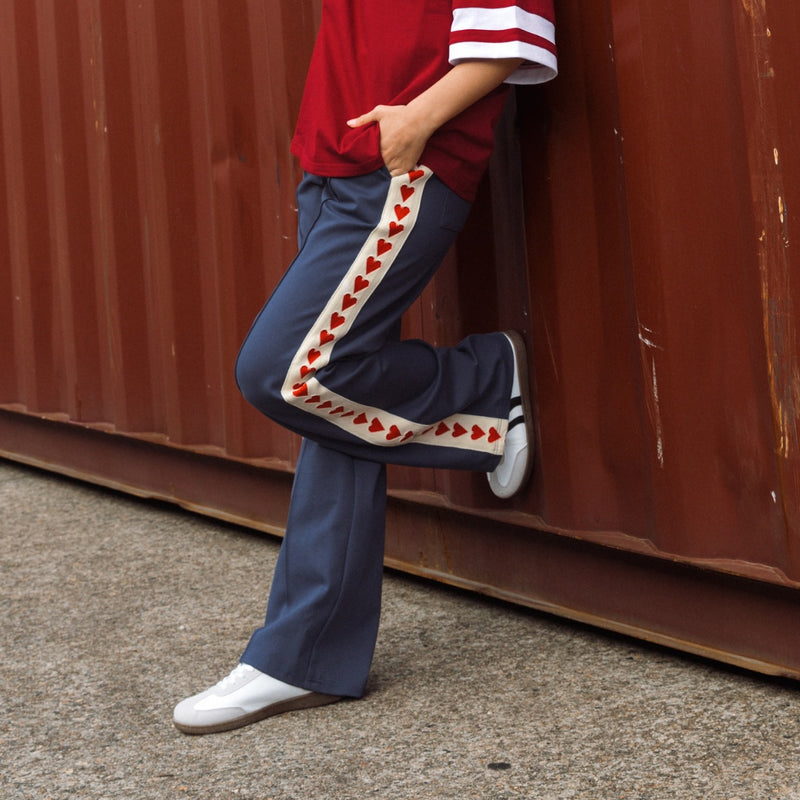 These pants can be worn with sneakers and a tee for a casual off duty look.