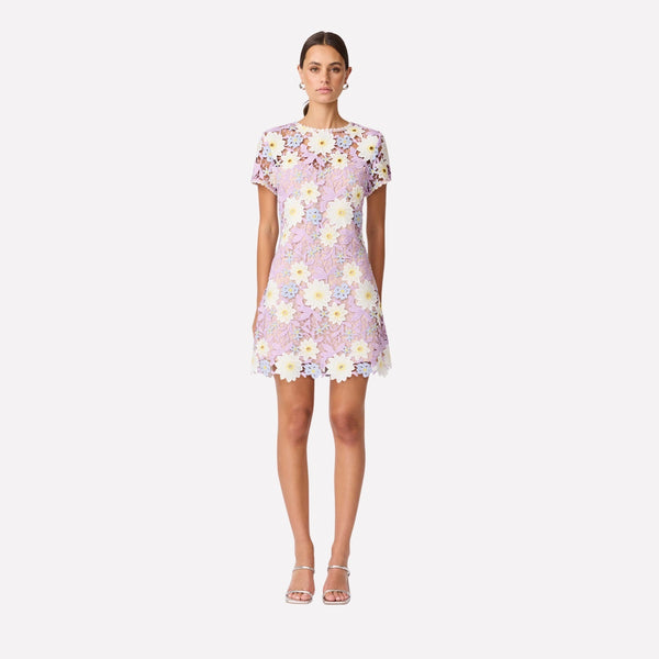 Our Sigrid Lace Dress has a beautiful lilac, yellow, white and blue floral lace fabric.