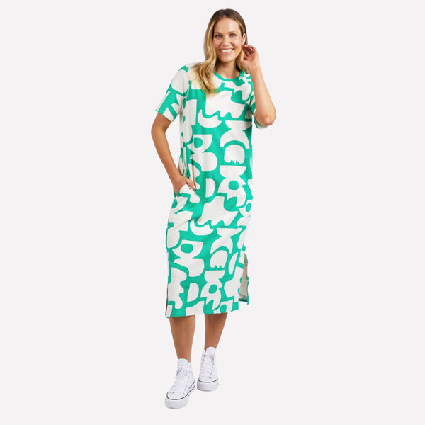 Our Miro Tee Dress by Elm is made from a cotton fabric with a bold green and white abstract print