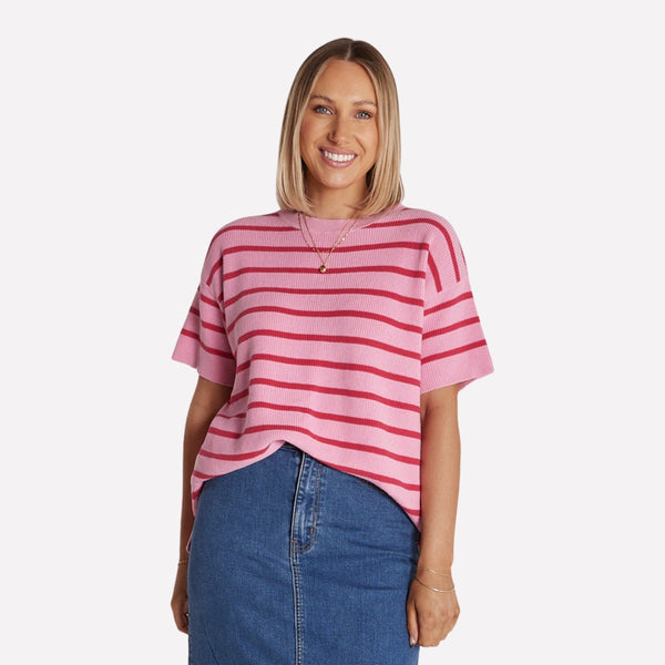 The tee has a slouchy fit with drop shoulders and short sleeves
