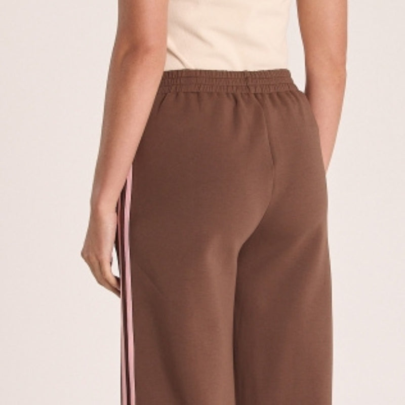 Upper back view of the pants featuring the elasticated waist.
