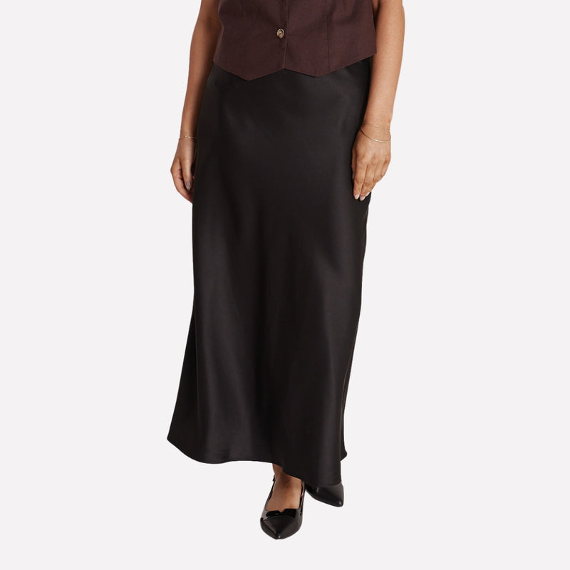 Our Riley Maxi Skirt is available in a black satin fabric