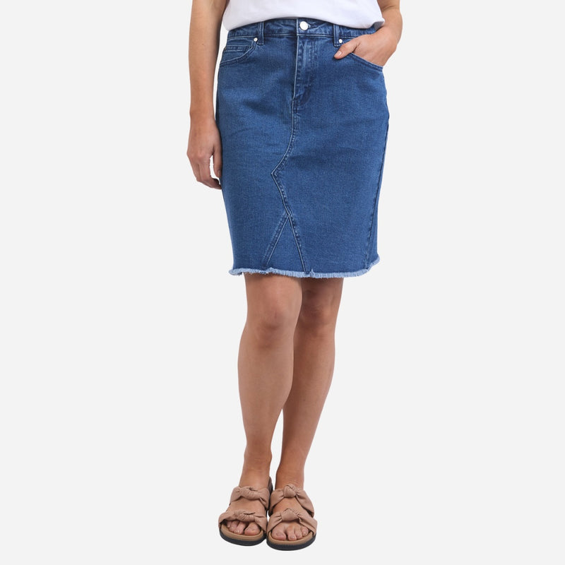 Our Foxwood Belle Denim Skirt is made from a mid wash denim fabric and it has a raw edge hem.