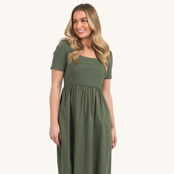 This dress features a ribbed bodice and sleeves and a lightweight cotton skirt