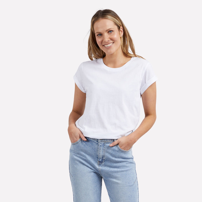 This white tshirt features a round neckline, short cuffed sleeves and it has a relaxed fit