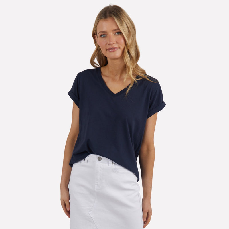 The navy tshirt features a V neckline, short cuff sleeves and a relaxed body