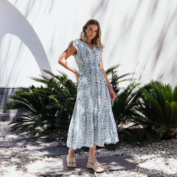 Rosette Floral Dress has a lovely ditsy print and features a V neckline, frill sleeve and a maxi skirt.