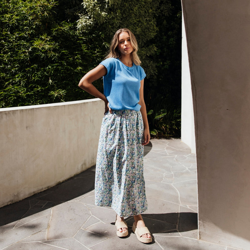 This maxi skirt looks fab with our Alma Metallic Knit Top in blue.