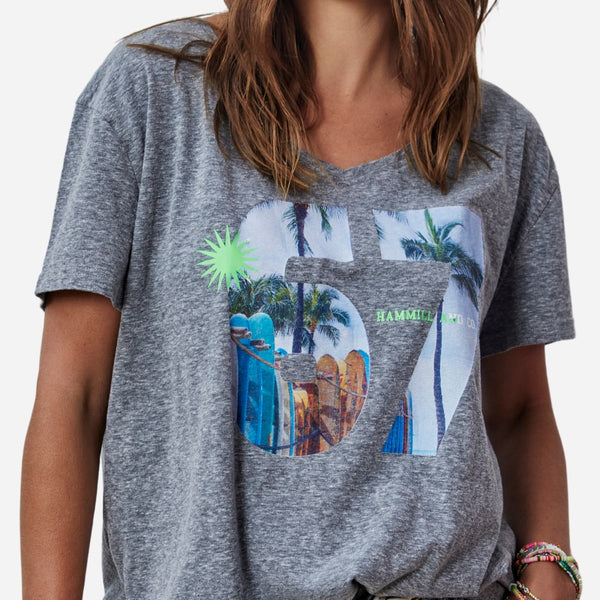 This tee features a photographic palm print '67' on the front and it has a V neckline