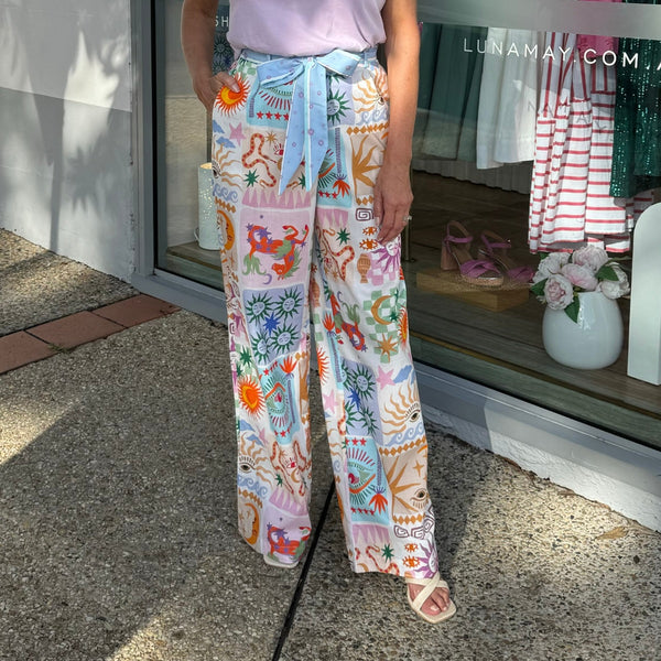 Our Palazzo Pants have an exclusive Zodiac print in lovely pastel tones.