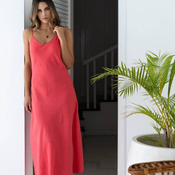 Casa Slip Dress which has a V neckline at the front and thin adjustable shoulder straps