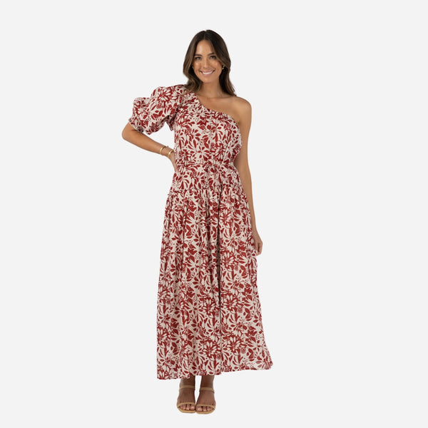 our Eden One Shoulder Maxi has an exclusive floral print in a brick and cream colour-way.  Features a puff one shoulder design, full maxi length skirt with asymmetrical gathering along the hip area.