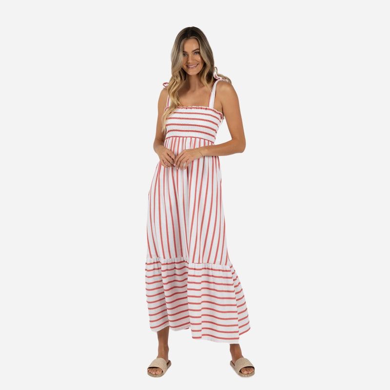 This cotton stripe dress features tie shoulder straps, shirred bodice and a frill hem.