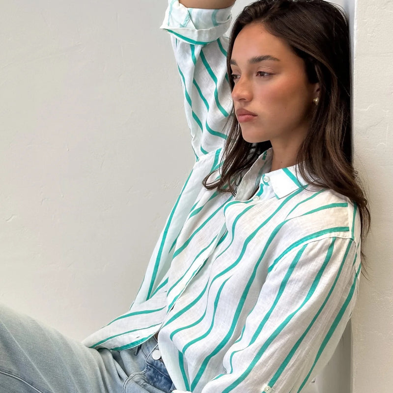 The boyfriend shirt has a collar, button front.