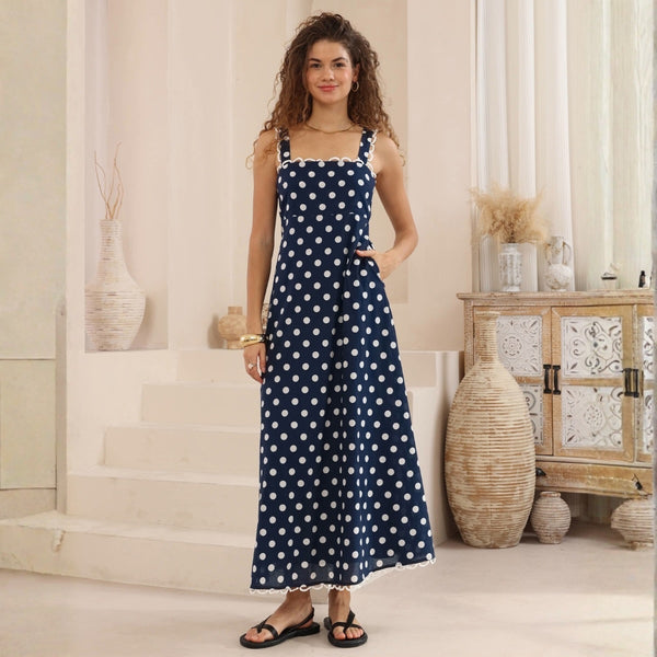 Our Annelise Maxi Dress has navy and white spots.