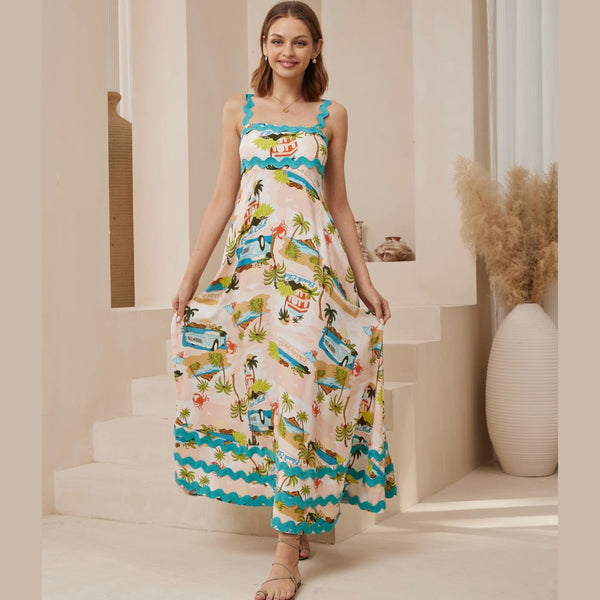 The dress has a square neckline, ric rac shoulder straps and a full maxi length skirt with ric rac detailing along the hem.