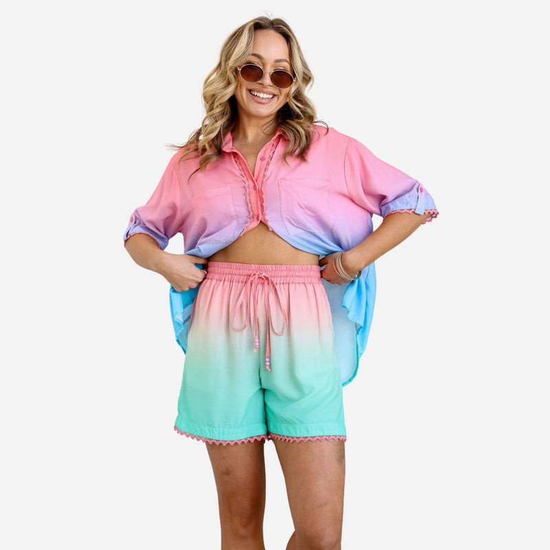 The short have a drawstring waist and range in colour from pink to a light aqua green.