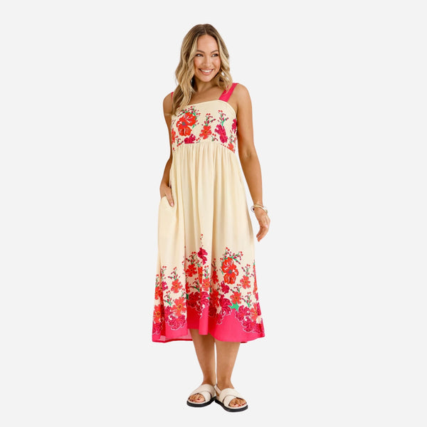 Quinton Floral Midi Dress with a cream base and a red floral print.