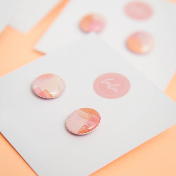 Marble-patterned earrings in pink, peach and white. These Blush Light Stud Earrings are lightweight.
