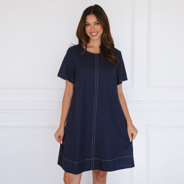 This classic shift dress has an Aline shape.