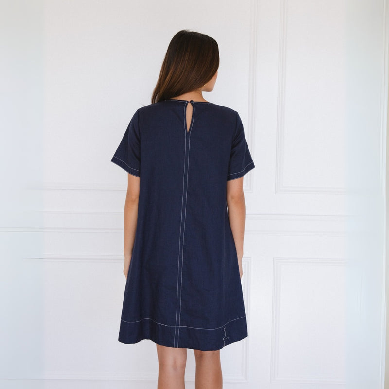 Back view of the dress - it has a keyhole cut-out with button closure.