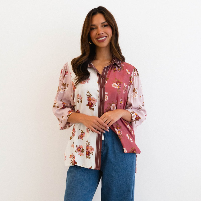 Our First Blush Shirt has a patchwork floral print in white, burgundy and pink tones.