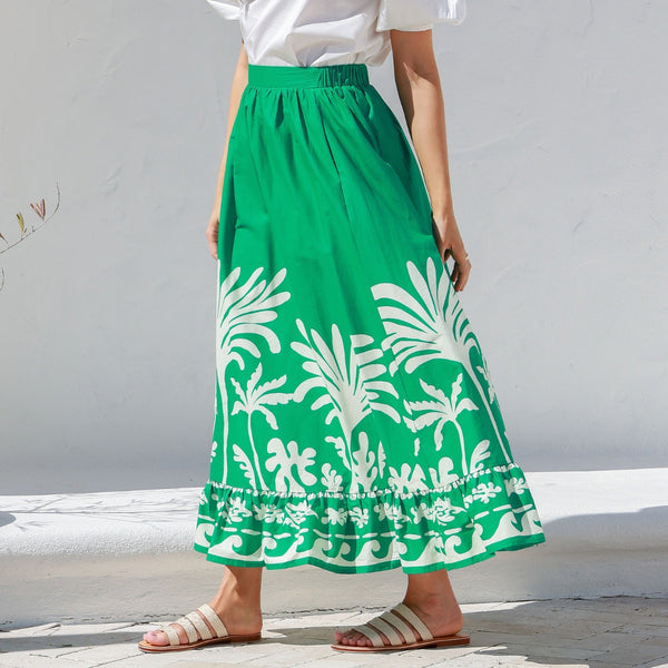 Side view of the skirt - with a flat waistband at the front and a frill hemline