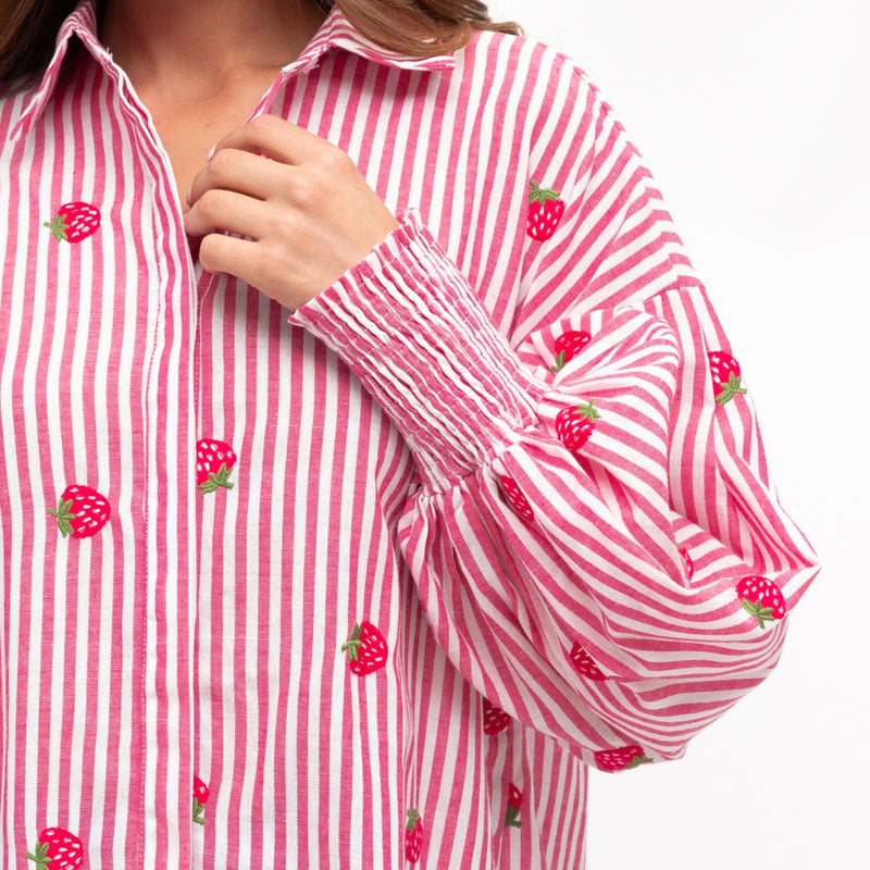 Close up of the shirred cuffs and the strawberry embroidery detail.