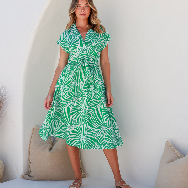 Our Wren Dress has a large green and white print