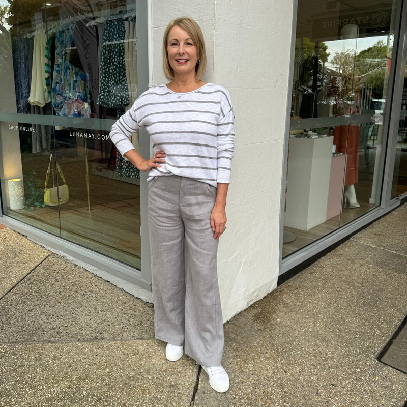 Wearing the pants with our Minnie Stripe Knit Top