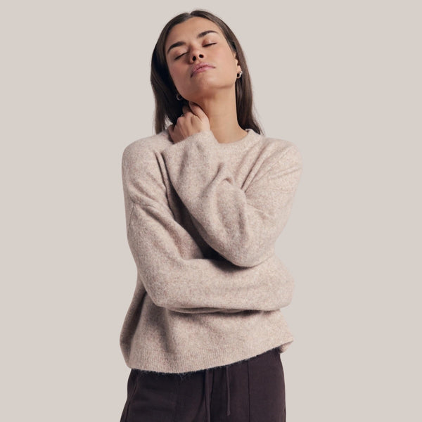 The beige knit is so soft and cosy. This neutral knit jumper will also work effortlessly with alot of colours in your wardrobe.