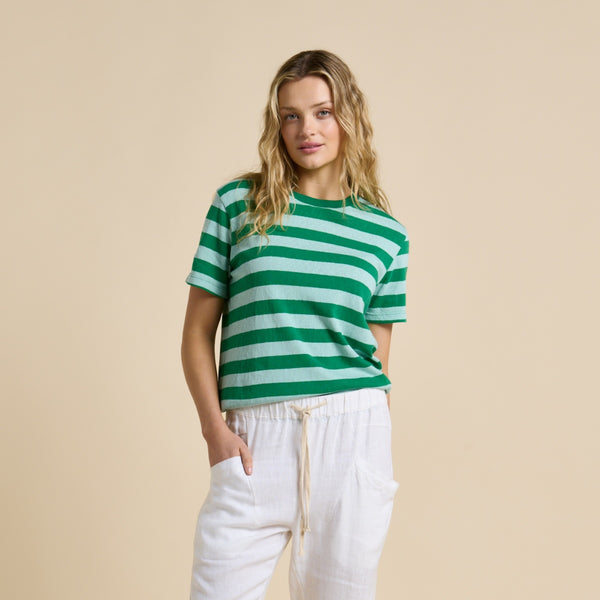 The tee has a classic fit and features a round neckline and short sleeves.