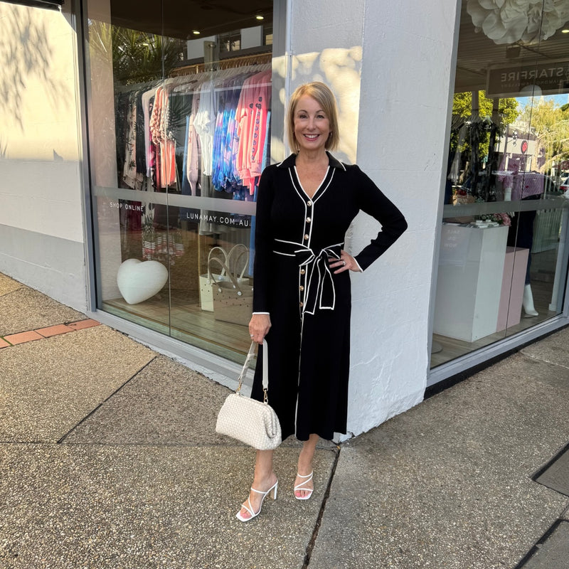 Accessorise with heels and a white bag.
