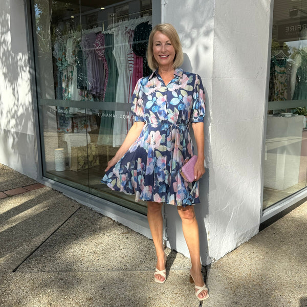 Blythe Floral Dress with a navy base and a pastel floral print