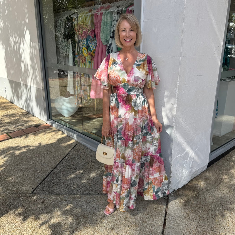 Accessorise with heels and a gorgeous bag.