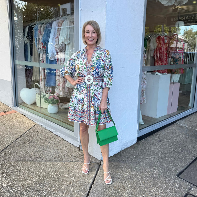 Our Cassian Floral Mini Dress has a vibrant and exclusive multi print.