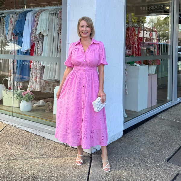 Wearing our Lilah Lace Dress in pink.