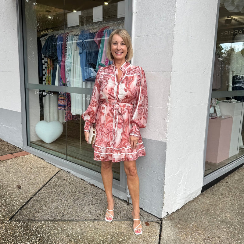 Our Tawnie Dress is available in a pink and white floral print.