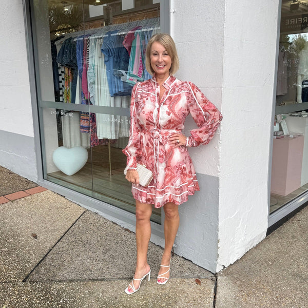 The dress can be accessorised with a clutch and heel.