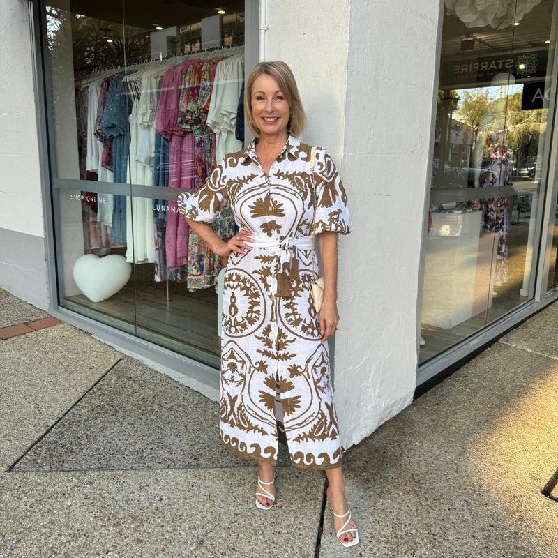 Tanya wearing our Mia Shirt Dress in a Size 8, is typically a Size 8-10 and is 165cm tall.