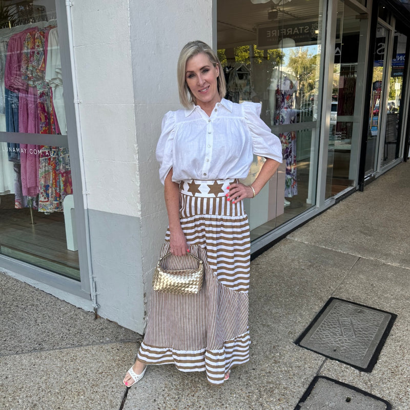 Lindy wearing the skirt with our Holly Shirt. Lindy is 161cm tall, is typically a Size 8 and wears a Size 8 in both items.