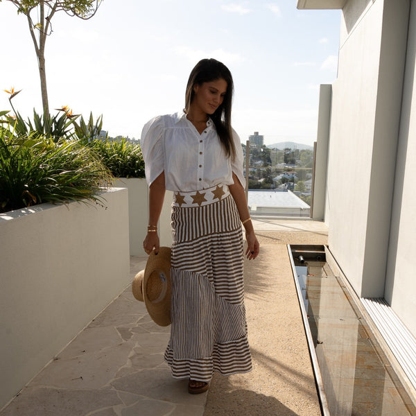 This stripe skirt can be worn with our Holly Shirt in white.