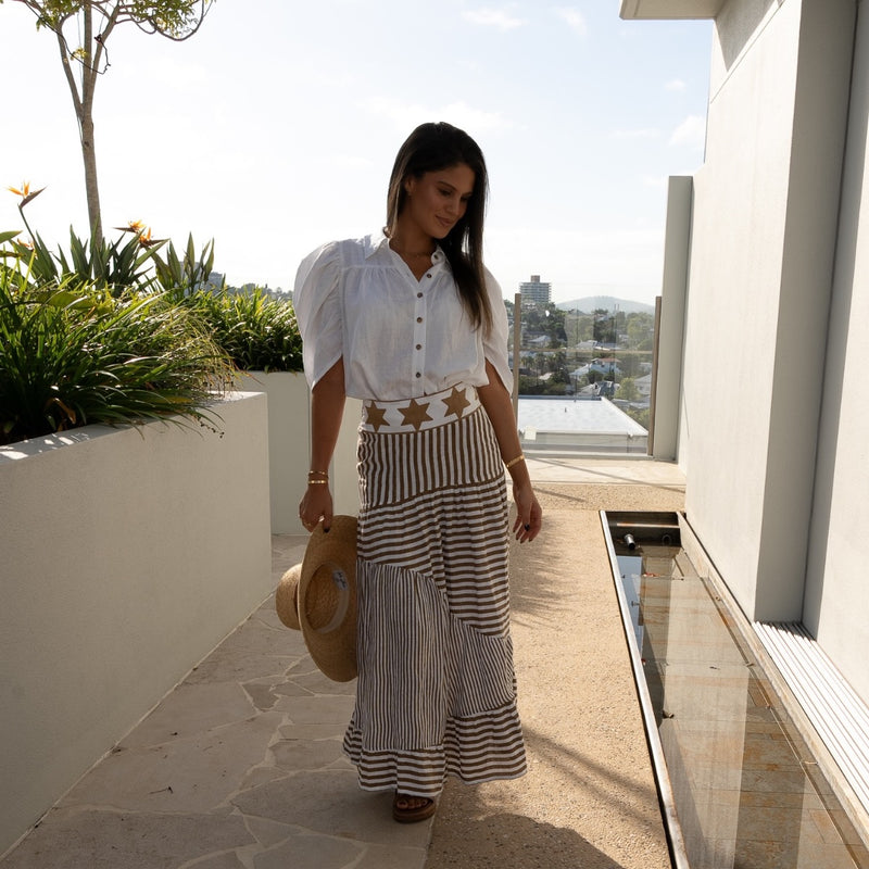 This stripe skirt can be worn with our Holly Shirt in white.