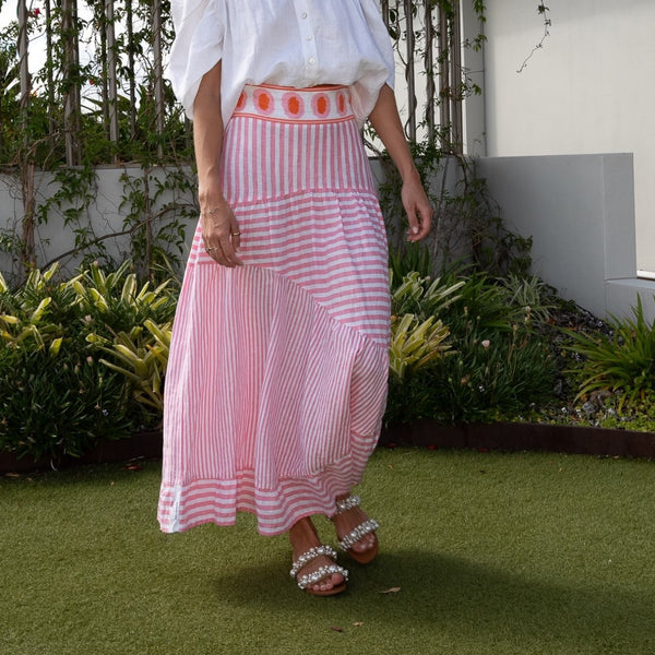Our Simone Stripe Skirt with pink and white stripes.