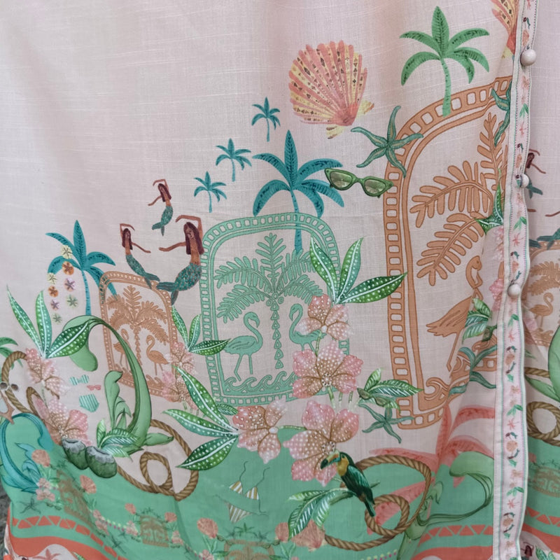 Close up of the gorgeous resort inspired print in peach, teal, green, brown and orange tones.