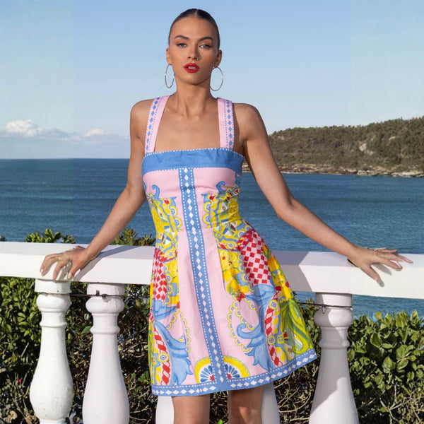 this stunning mini dress has a halter neckline, fitted bodice, flared short skirt.